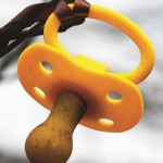 399px-yellow_pacifier_in_a_tree
