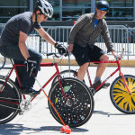Bicyclicts enjoying an open-to-all game of bike polo