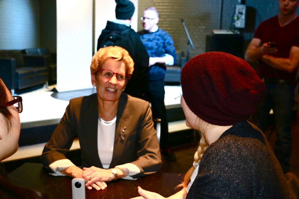 Premier of Ontario Kathleen Wynne speaking to students at UW's Bombshelter Pub during pub night. Photo by Ramona Leitao