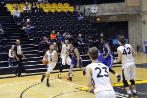 The men’s basketball team could not keep up with the Rams’ relentless offence. Photo by Ju Hyun Kim